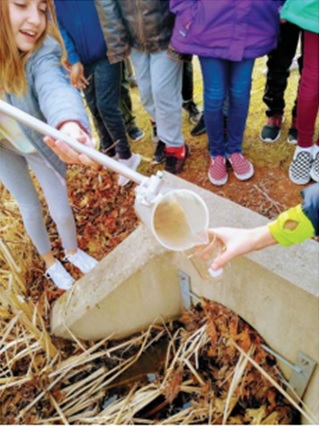 Students collecting water samples